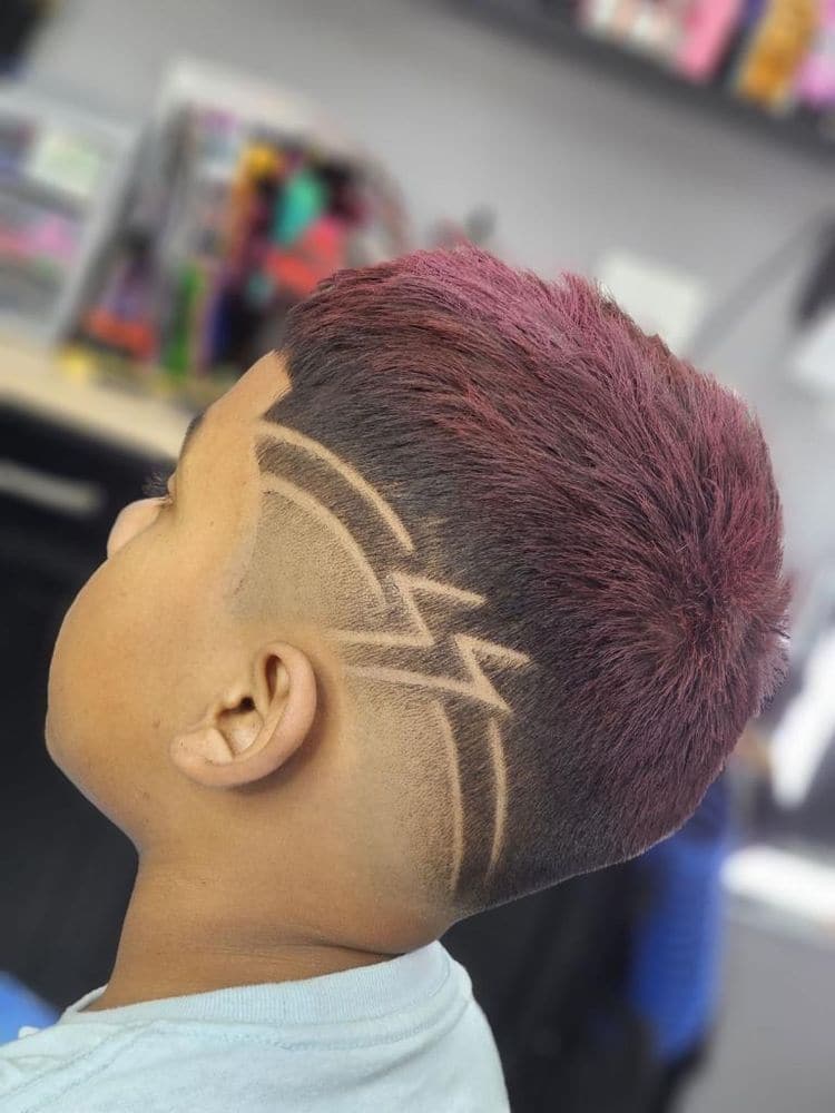 Freehand hair design cut into a fresh fade